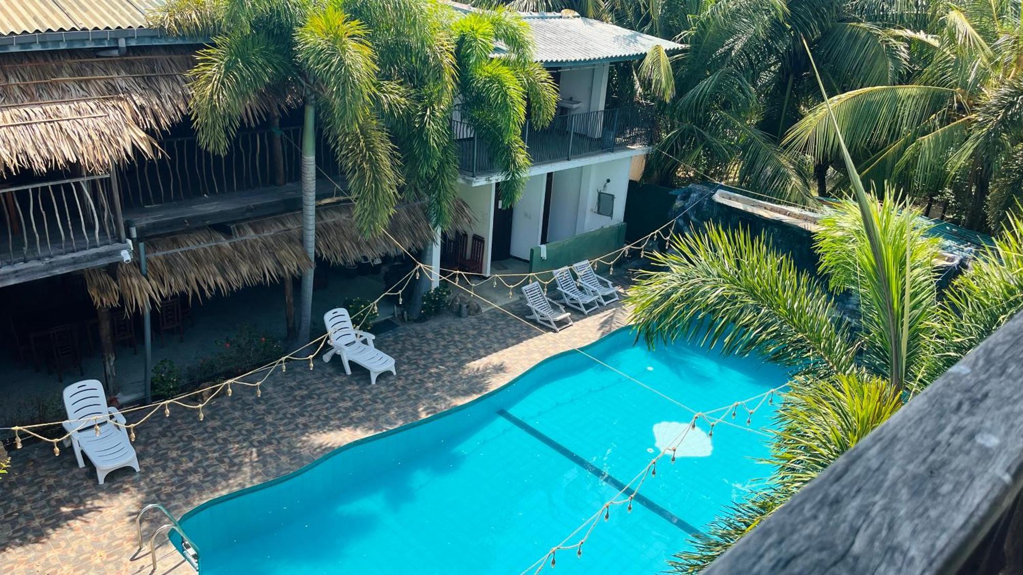 Shell Resort อารูกัมเบย์ ภายนอก รูปภาพ